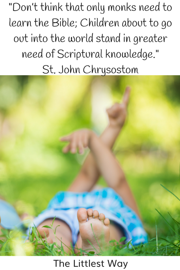 A child laying in the grass to illustrate this Sunday quote about teaching Children to read the scriptures.