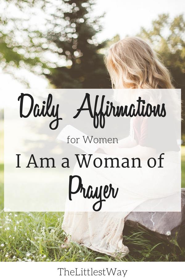A woman sitting alone reading or praying as we examine our daily affirmations to include, "I am a woman of prayer."